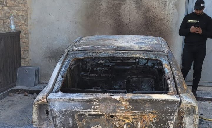 A burned car in the West Bank